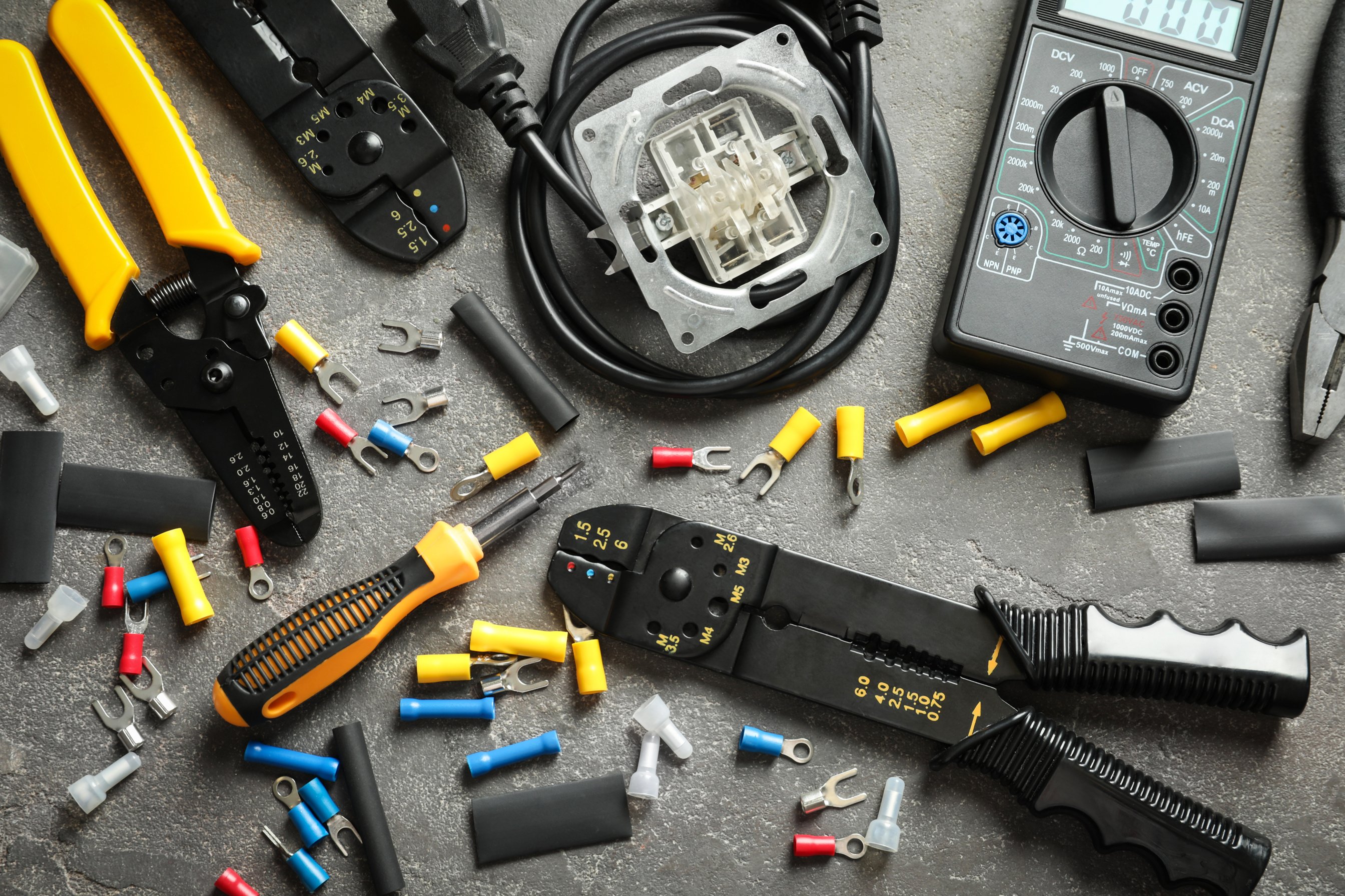 Different Electrical Tools on Grey Background